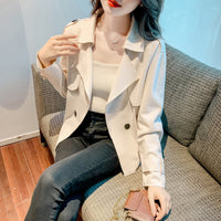 Women In Fashionable Small Suits This Year